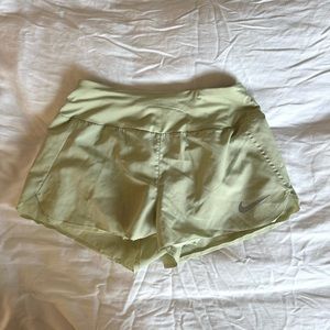 nike light green dri fit athletic shorts